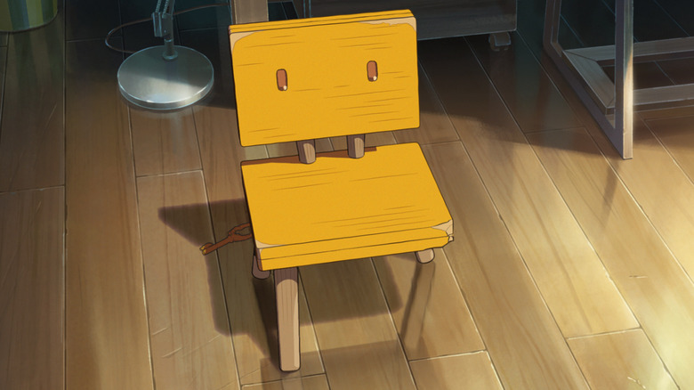 Sōta as a chair in Suzume