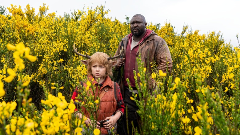 Christian Convery and Nonso Anozie in Sweet Tooth