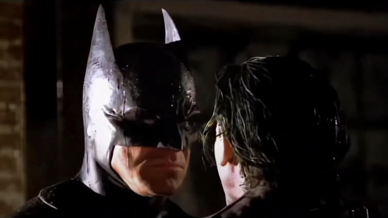 Clark Bartram's Batman stares menacingly at the Joker, who is seen from behind, in the fan film Batman: Dead End