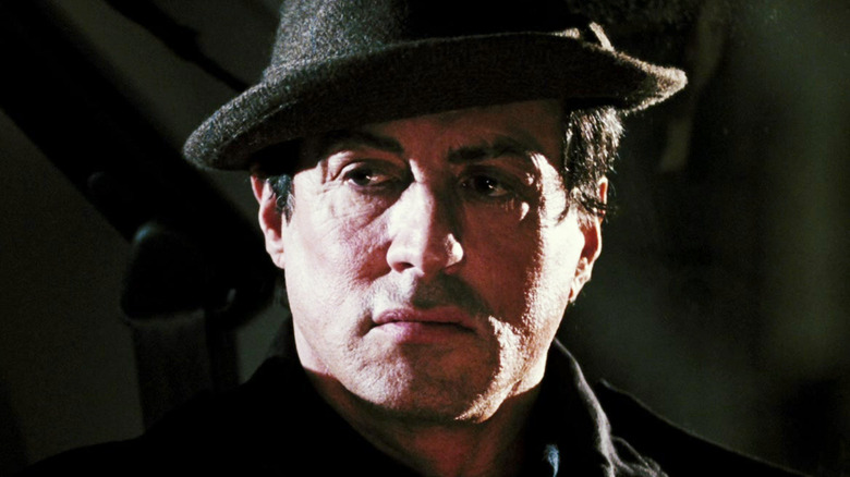 Sylvester Stallone's Rocky Balboa stands in the darkness in Rocky Balboa