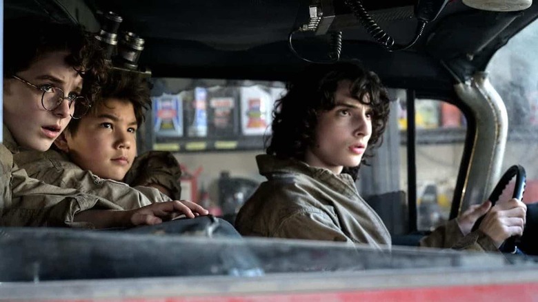 L to R: Mckenna Grace, Logan Kim, Finn Wolfhard in Ghostbusters: Afterlife