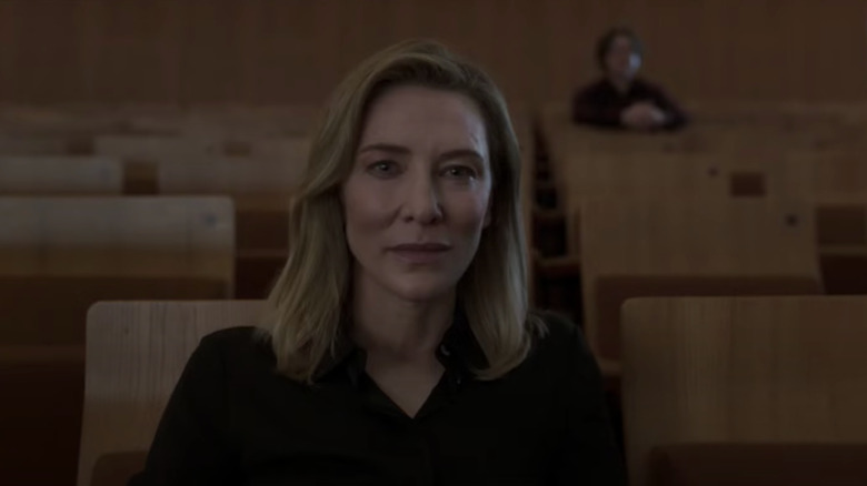 Cate Blanchett's Lydia Tár observes from seat