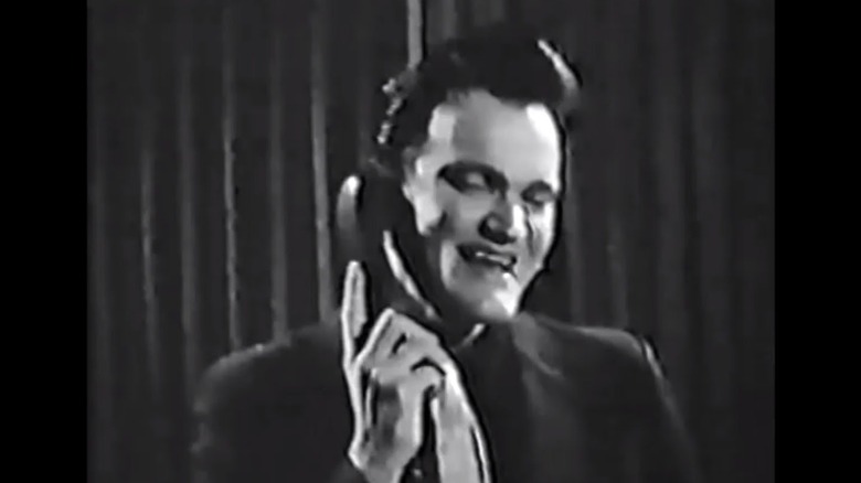 Young Tarantino on the phone