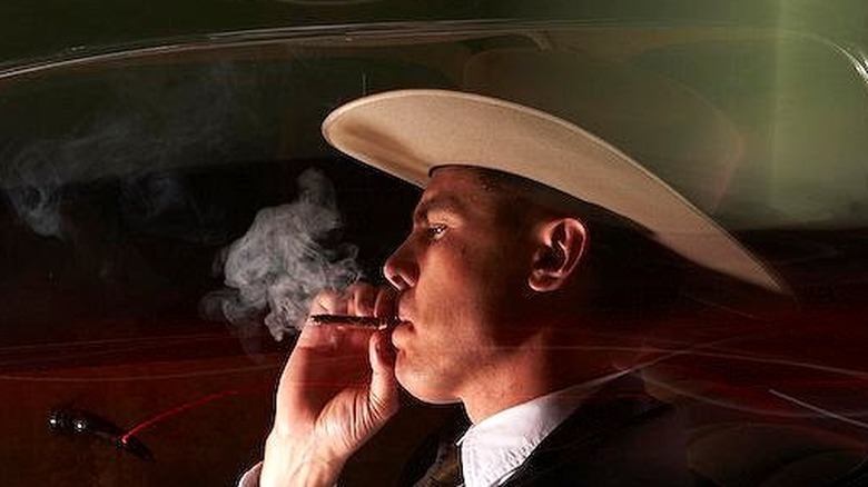 Casey Affleck smokes in car