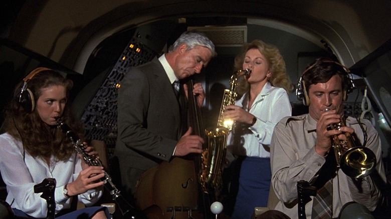 Julie Hagerty, Leslie Nielsen, Lorna Patterson, and Robert Hays in "Airplane!"