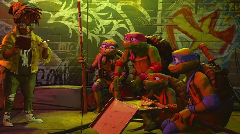 April and the Turtles in Teenage Mutant Ninja Turtles: Mutant Mayhem