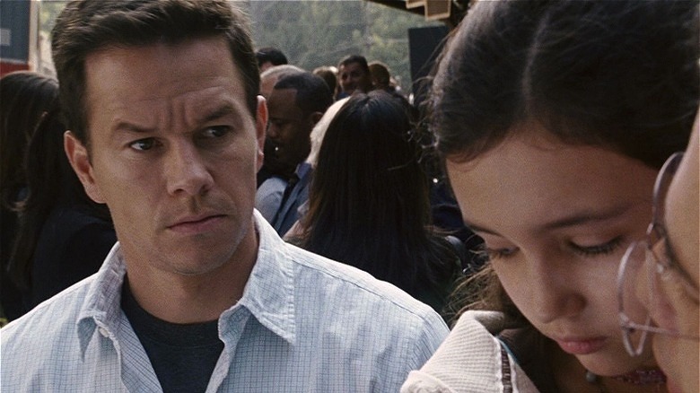 Mark Wahlberg with young girl held by father