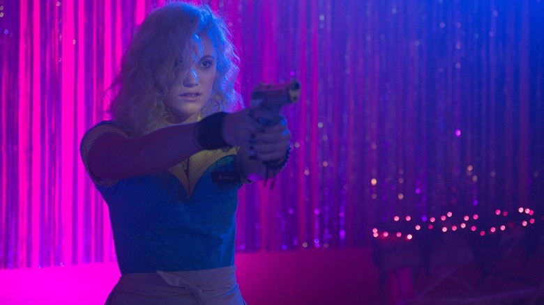 The Guest Maika Monroe with a gun