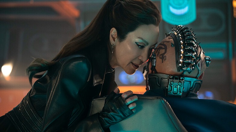 Michelle Yeoh's Philippa Georgiou leans ominously in to whisper to Joe Pingue's Dada Noe in Star Trek: Section 31