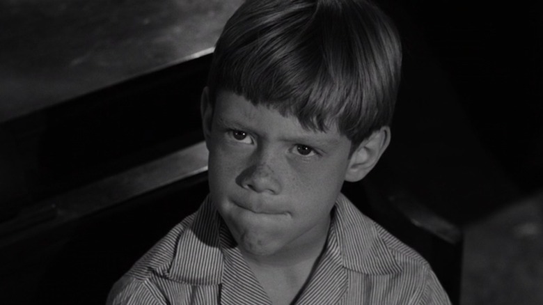 Bill Mumy as Anthony scowls up at an adult in It's A Good Life