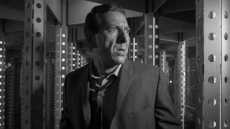 Jack Klugman as Max looks terrified in a hall of mirrors, in In Praise of Pip