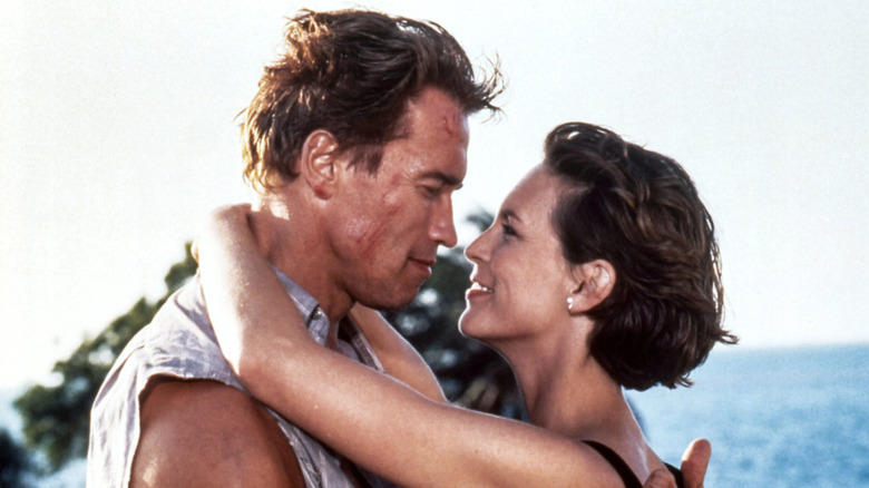 True Lies' Arnold Schwarzenegger and Jamie Lee Curtis embracing