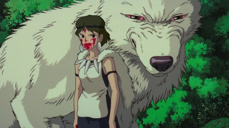 San looking menacingly with her wolf in Princess Mononoke