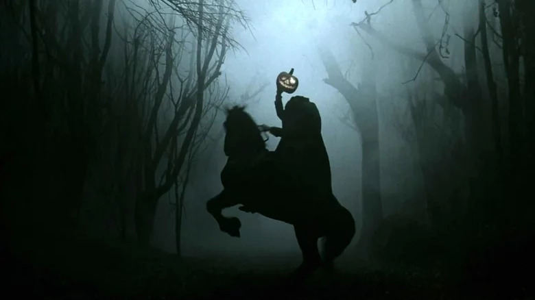 A silhouette of the Headless Horseman holding a jack-o'-lantern in Sleepy Hollow