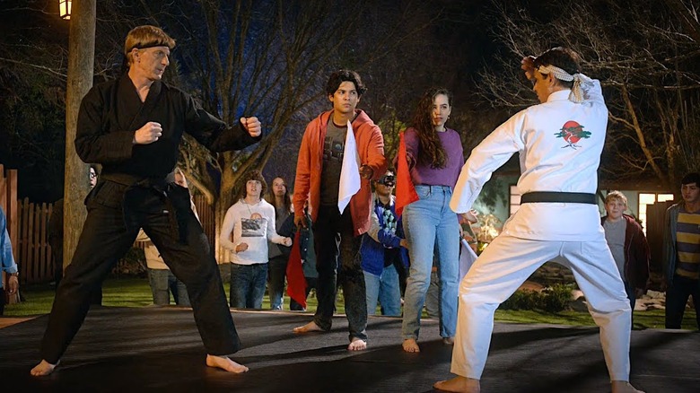 William Zabka's Johnny Lawrence and Ralph Macchio's Daniel LaRusso in a match on Cobra Kai