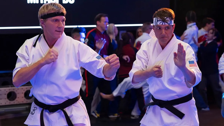 William Zabka's Johnny Lawrence and Ralph Macchio's Daniel LaRusso ready to fight on Cobra Kai