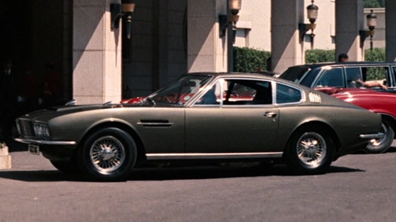 James Bond's Aston Martin sits outside a hotel in On Her Majesty's Secret Service