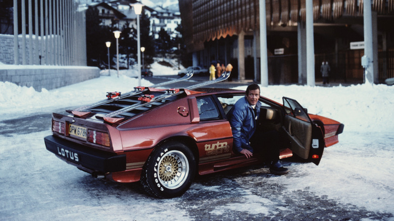 James Bond (Roger Moore) exits his parked Lotus Esprit Turbo in For Your Eyes Only