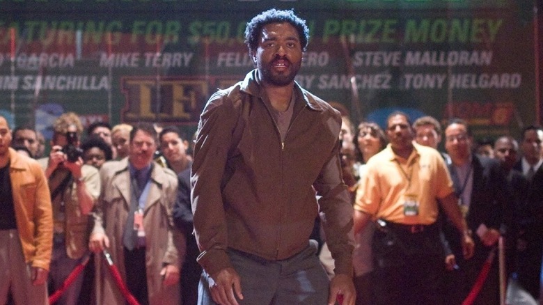 Chiwetel Ejiofor as Mike Terry, standing outside a fight in Redbelt