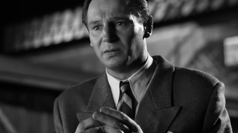 Oskar Schindler holding his ring in Schindler's List