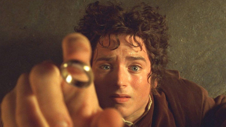 Frodo looking up catching the One Ring in The Lord of the Rings: The Fellowship of the Ring