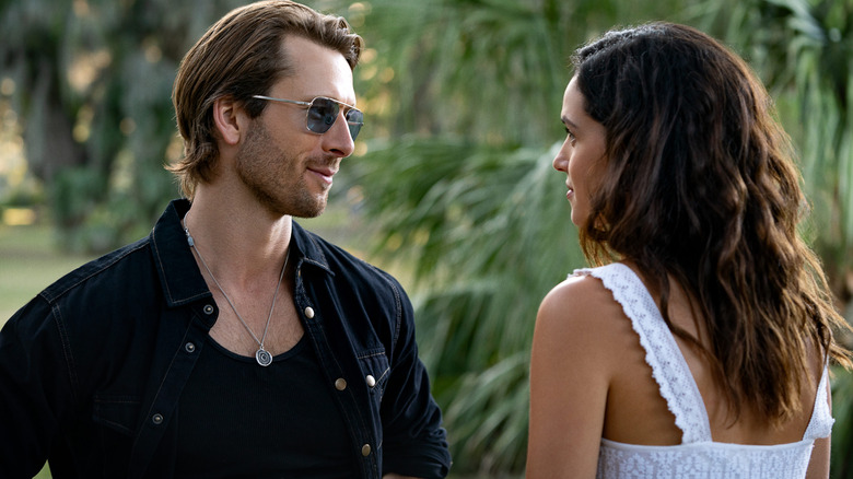 Glen Powell as Gary Johnson and Adria Arjona as Madison in Hit Man