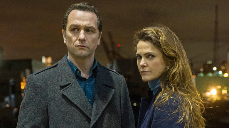 Matthew Rhys and Keri Russell standing The Americans