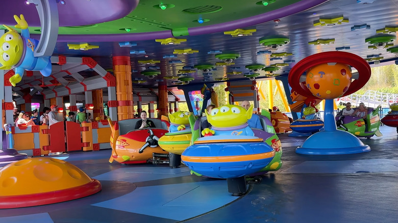 A wide shot of the Alien Swirling Saucers ride