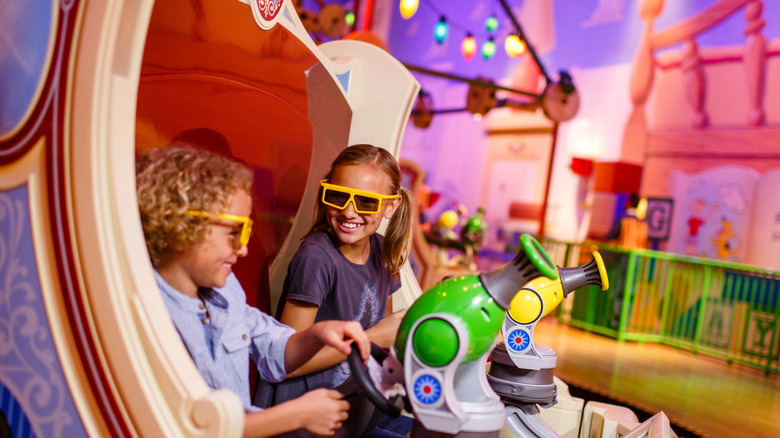 Kids having fun on Toy Story Mania