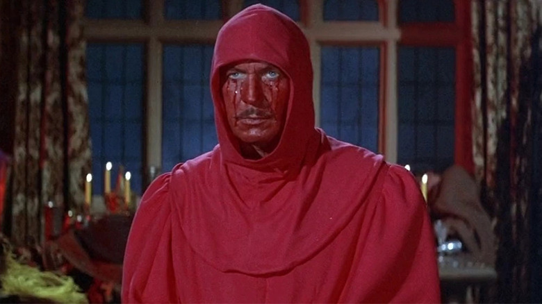 Vincent Price covered in red in The Masque of the Red Death