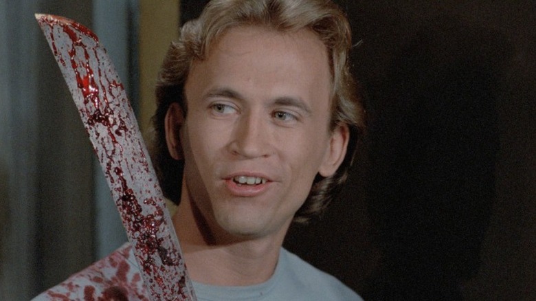 Mark Soper with bloody machete