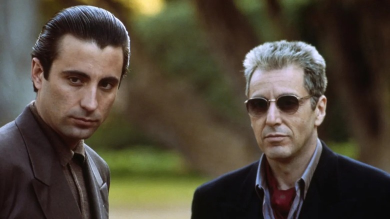 Vincent Corleone and Michael Corleone glowering at something off-screen to their right in The Godfather Part III