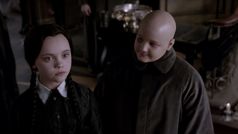 Christina Ricci and Jimmy Workman in The Addams Family