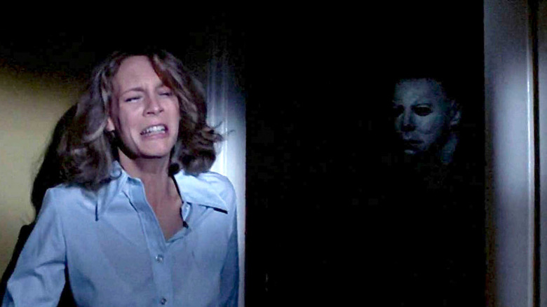 Jamie Lee Curtis Laurie Strode hides from Michael Myers