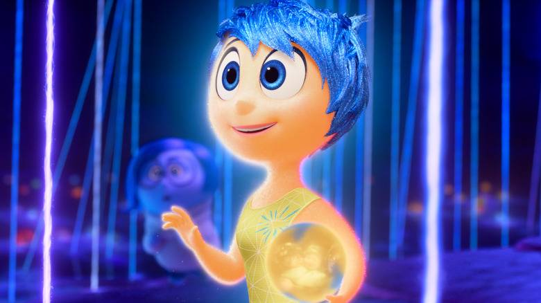 Joy and Sadness saving a memory for Riley in Inside Out 2