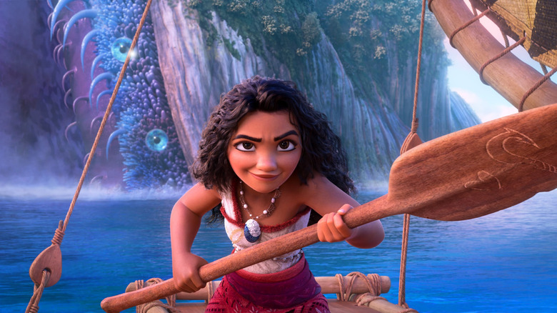 Auli'i Cravalho as Moana riding out into the ocena in Moana 2