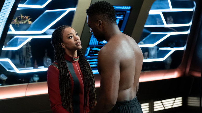 Sonequa Martin-Green as Michael and David Ajala as Book having an intense conversation in Star Trek: Discovery