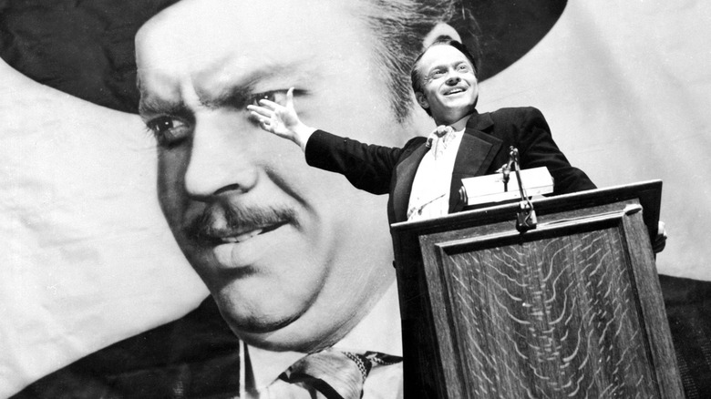 Orson Welles as Charles Foster Kane giving a speech in Citizen Kane.