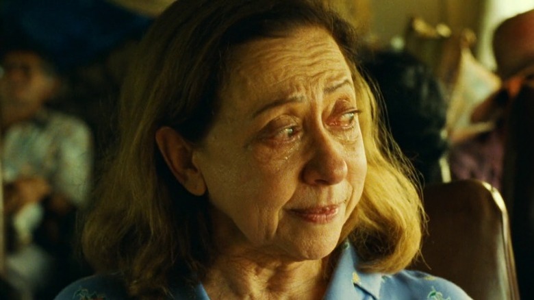 Fernanda Montenegro as Isadora Teixeira sitting in a bus and crying in Central Station