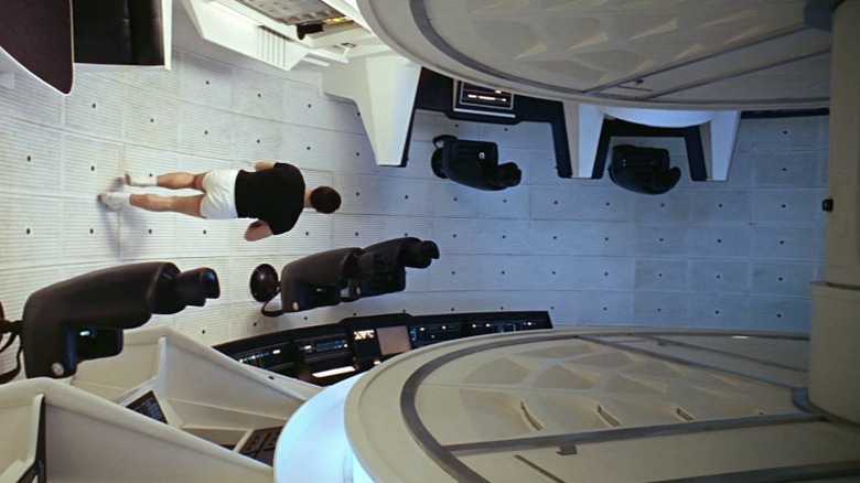 Keir Dullea as Dr. David Bowman jogging through the Discovery One in 2001: A Space Odyssey