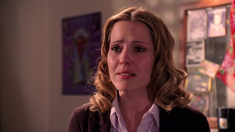Buffy's Anya with standing with tears in her eyes