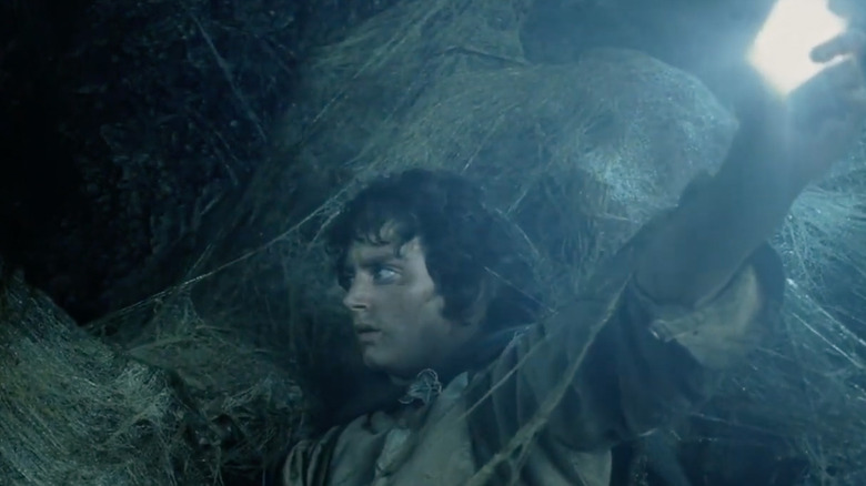 Frodo lights up a dark cave LOTR