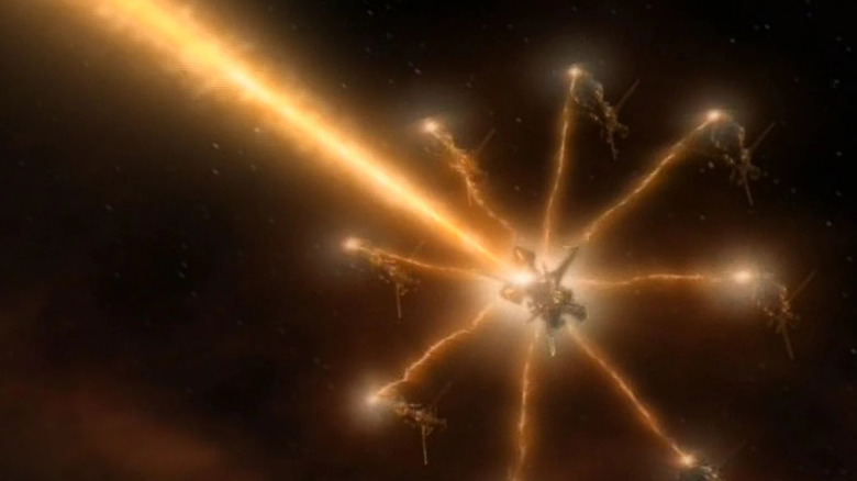 Several bioships of Species 8472 combining their weapons.