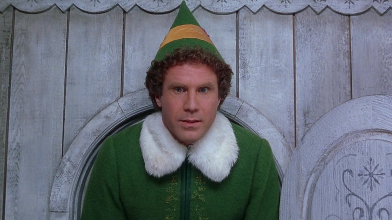 Will Ferrell's Buddy emerges from a too-small door in Elf