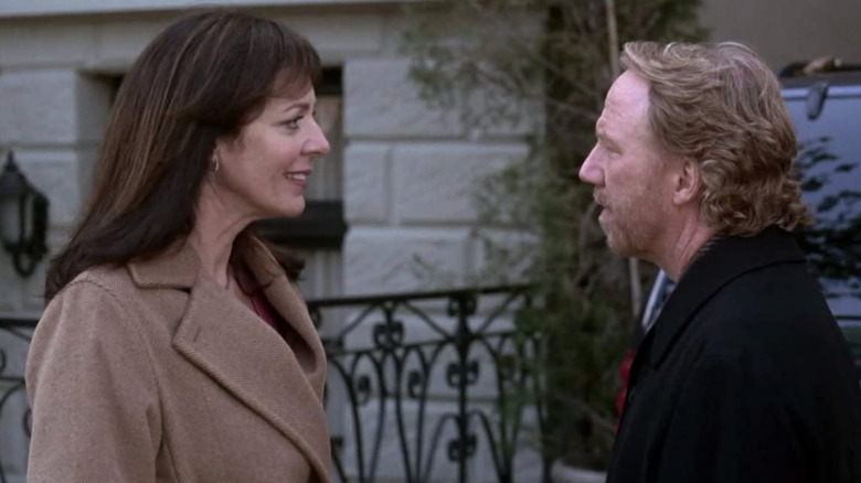 Allison Janney Timothy Busfield coats talking The West Wing