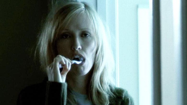 Janel Moloney brushing teeth The West Wing