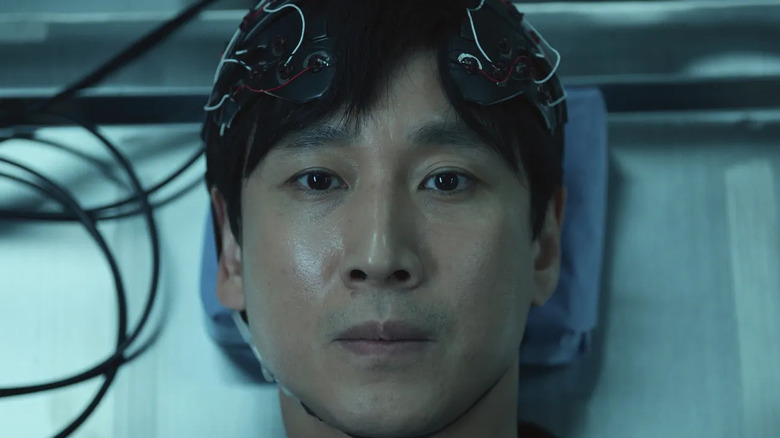 Sewon Koh (Lee Sun-kyun) is hooked up to his neurological machine in Dr. Brain