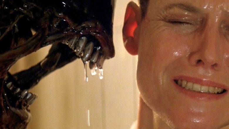Sigourney Weaver winces from alien