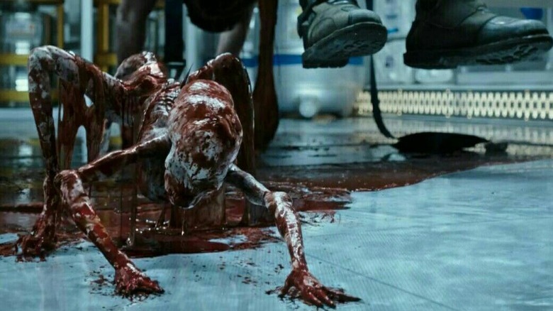 bloody Neomorph in Alien Covenant crawling across floor