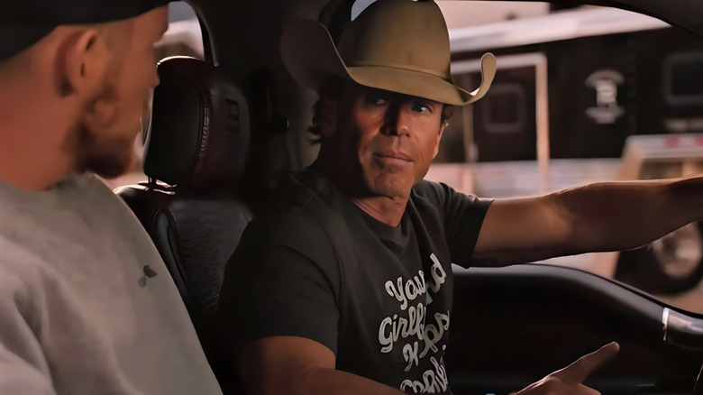 Jimmy and Travis sitting in a truck on Yellowstone